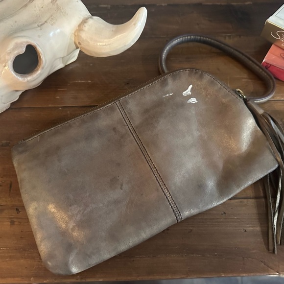 HOBO Handbags - Hobo -Metallic Tan Clutch with tassel